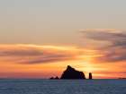 Rialto Beach, Olympic Peninsula, Washington State. Seastack silhouetted at sunset. Art Print